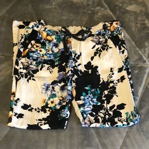 ladies small straight leg scrub pants. 1 of each: floral and snake